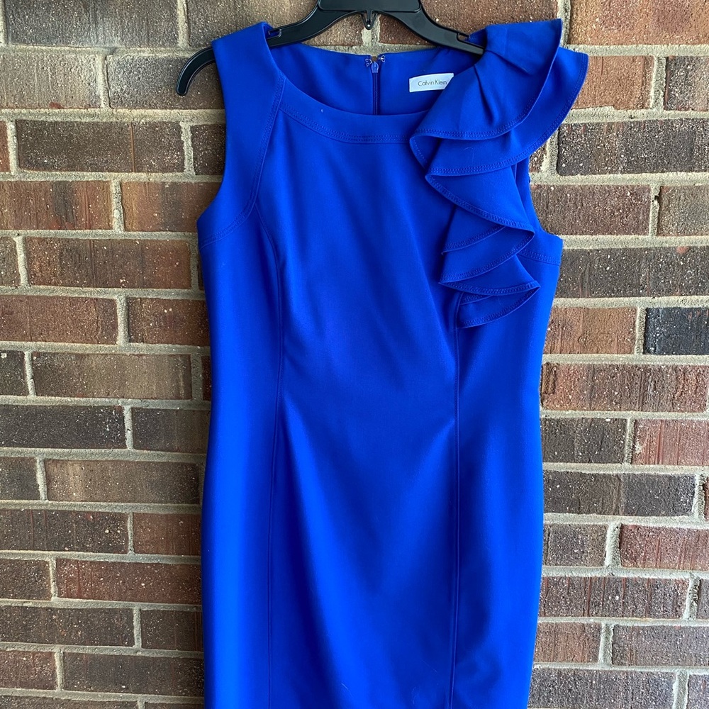 Calving Klein ruffle shoulder dress
